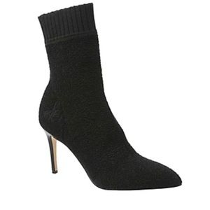 Pointed and peaked on a stiletto heel,stretch knit booties by Sam Edelman